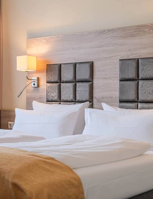 double bed of a studios in the Suite Hotel Leipzig
